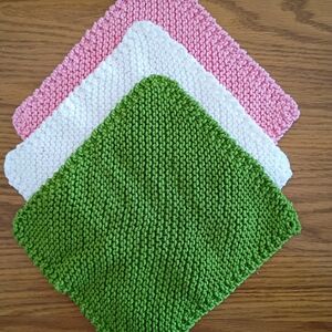 Set of Three Knitted Washcloths - Green, White, Pink
